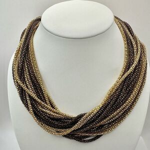 Gold tone multi strand statement necklace